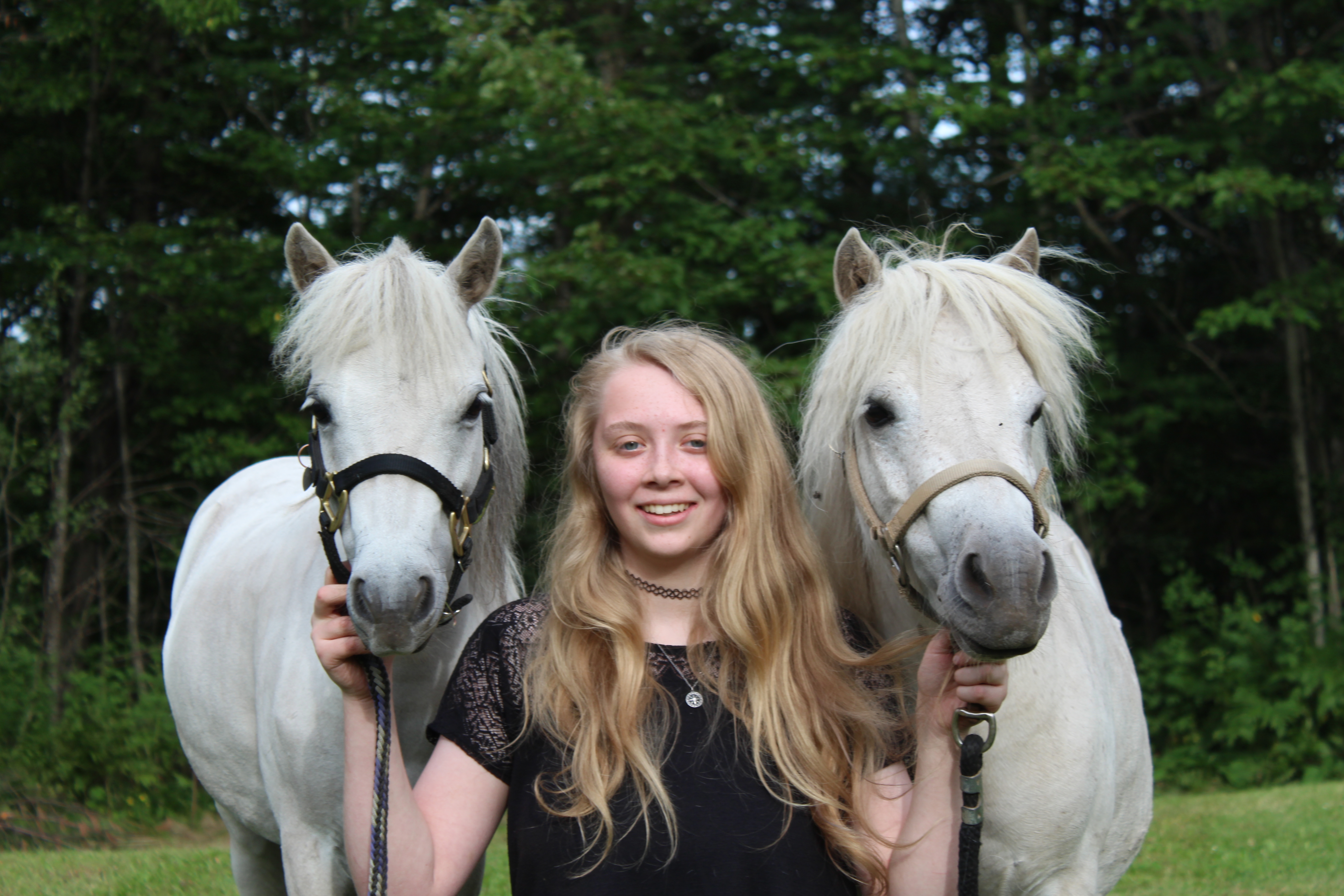 Makenzie with her horses.